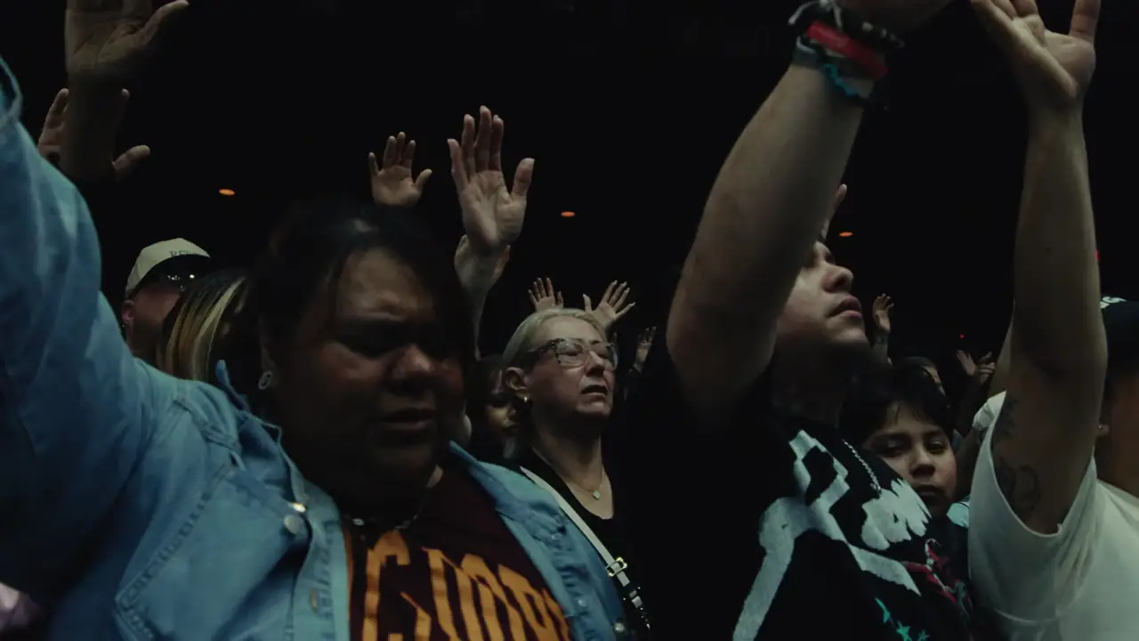 Full stage with choir, band and lyrics on the drape during What A Miracle Feels Like